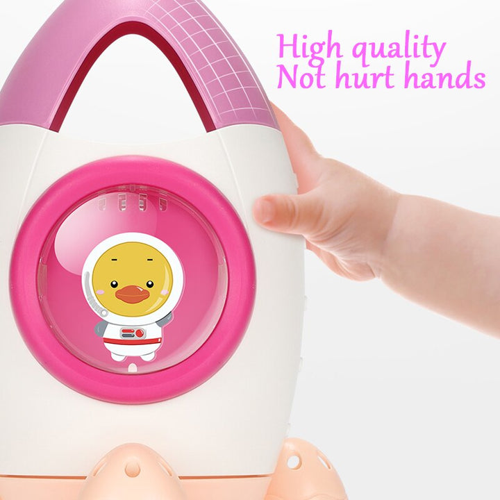Tên lửa tự động xoay nhả nước đồ chơi em bé tắm